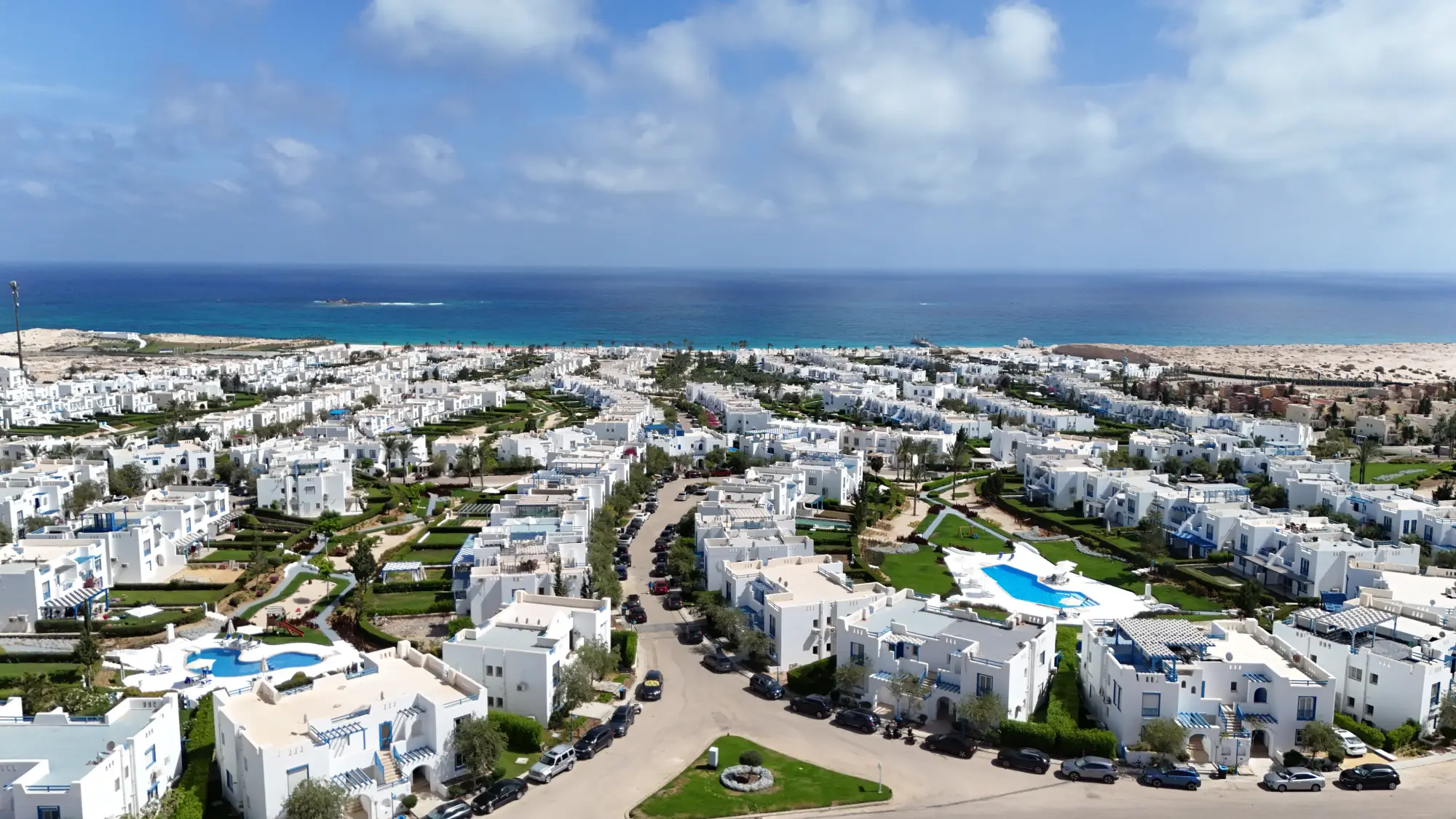 Mountain View Ras El Hekma resort with Greek-inspired architecture and crystal lagoons on Egypt’s North Coast